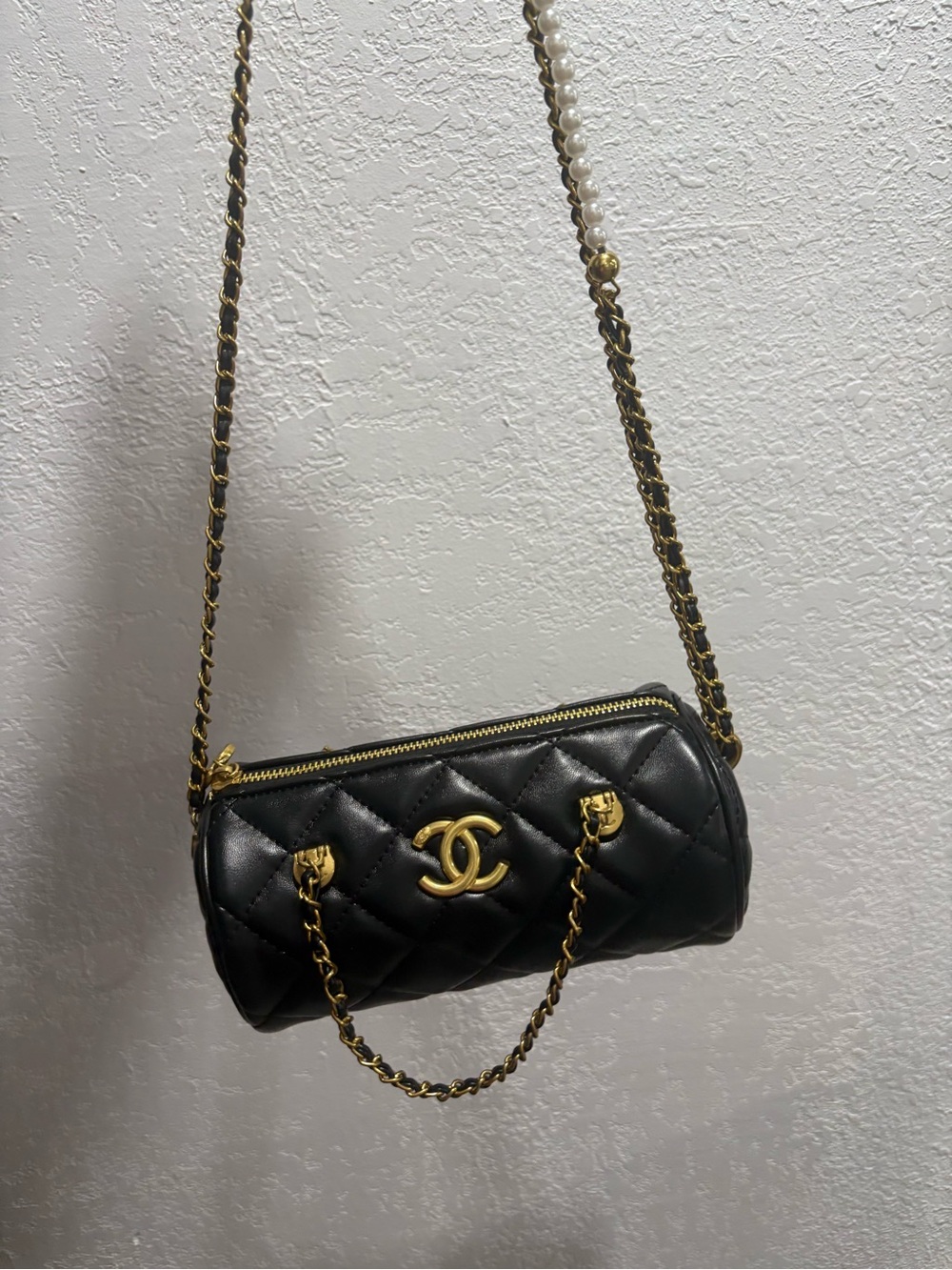 CHANEL Black Quilted Mini Barrel Bag with Gold Hardware